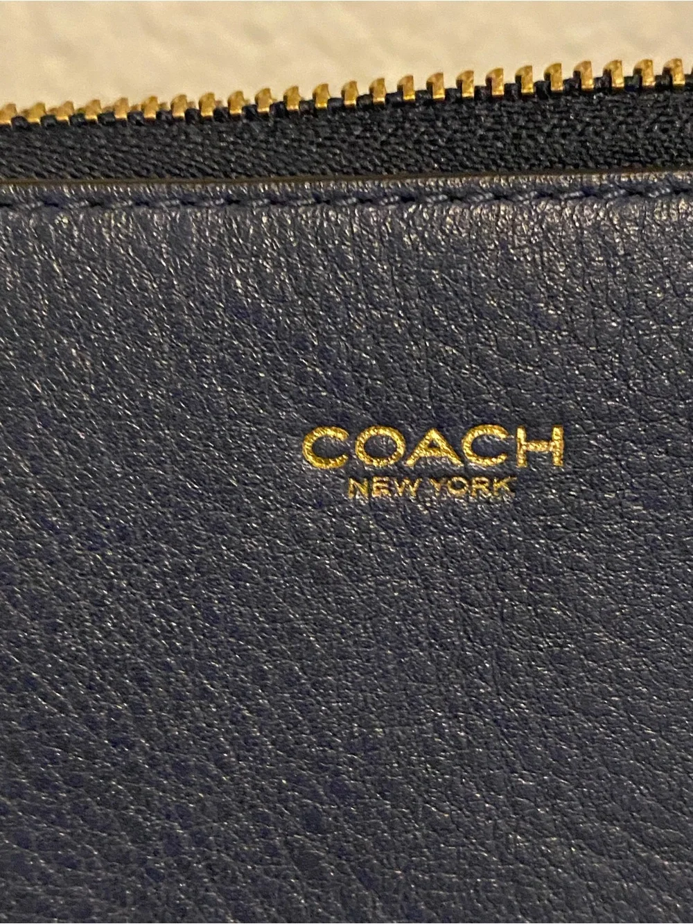 Coach Navy Pebbled Leather Mini Wristlet with Gold Hardware
